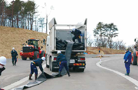 Training in unrolling hoses to transfer cooling water