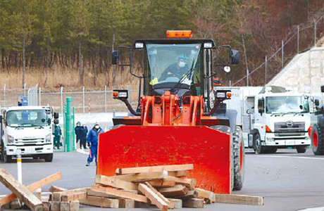 Training in removing debris to secure access route